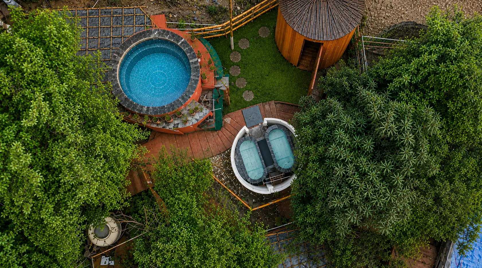 Aerial view of the Tapas sauna, ice bath and soaking pool in the forest