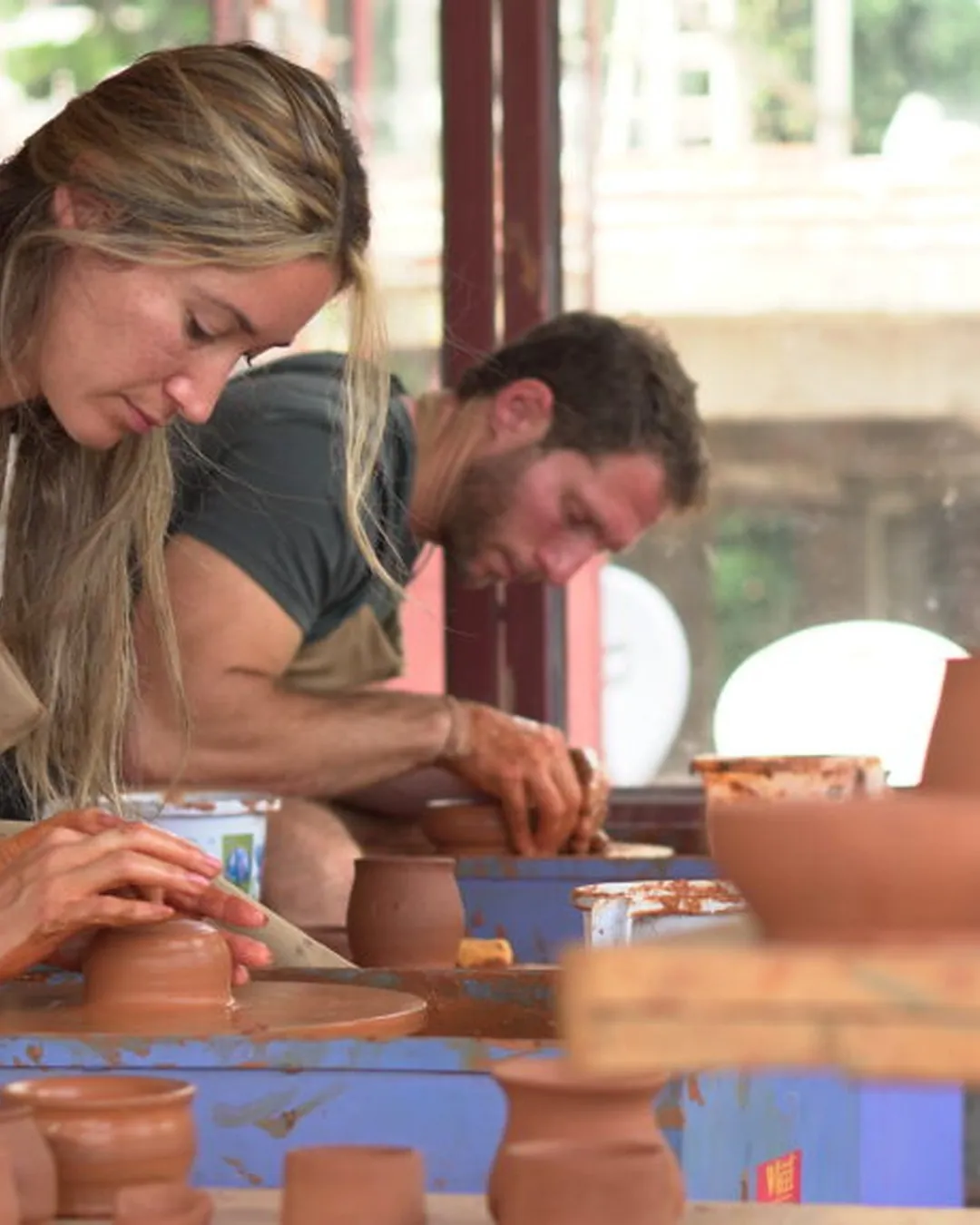 Couple at the pottery wheel