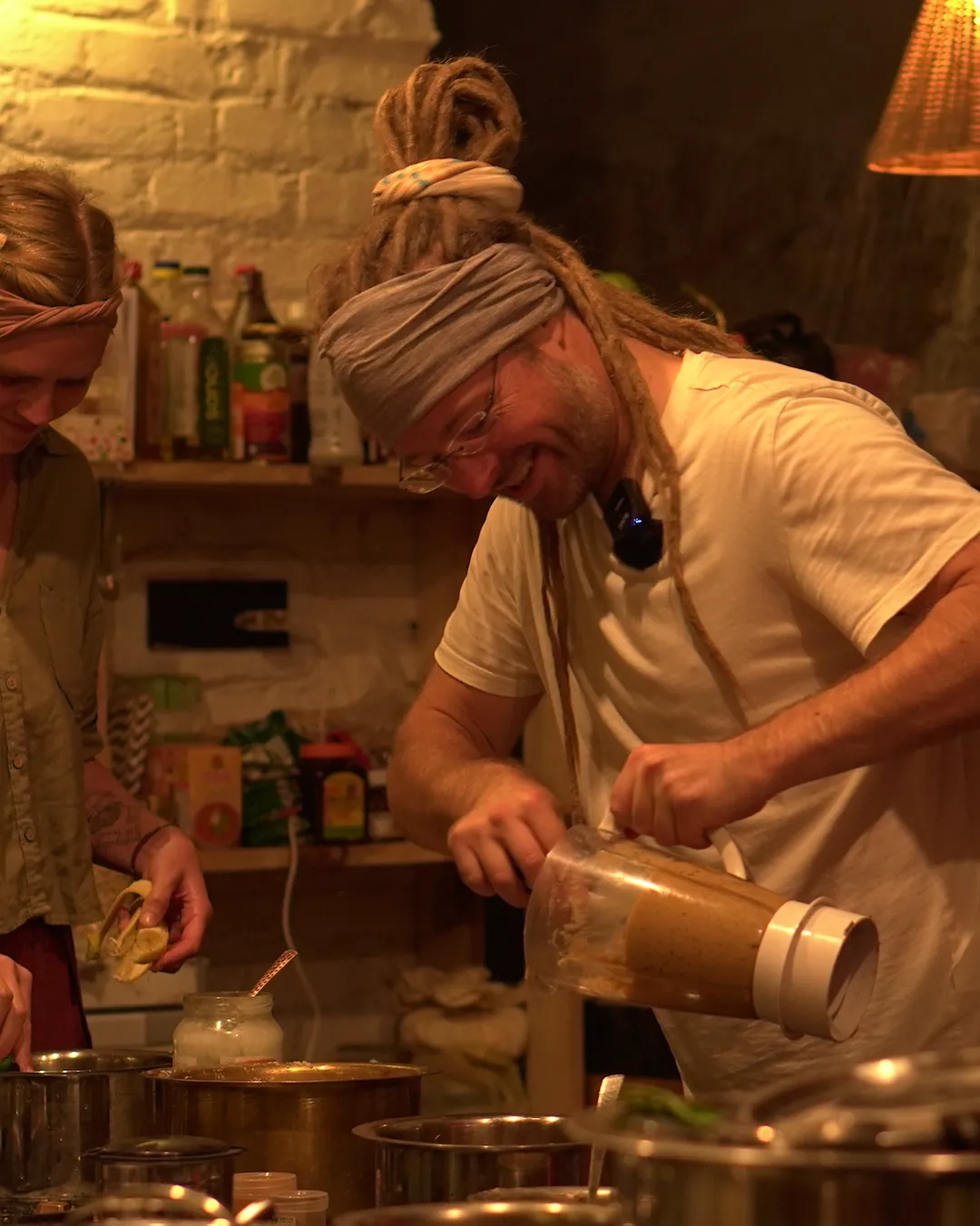 Late-night kitchen — pouring fresh nut butter