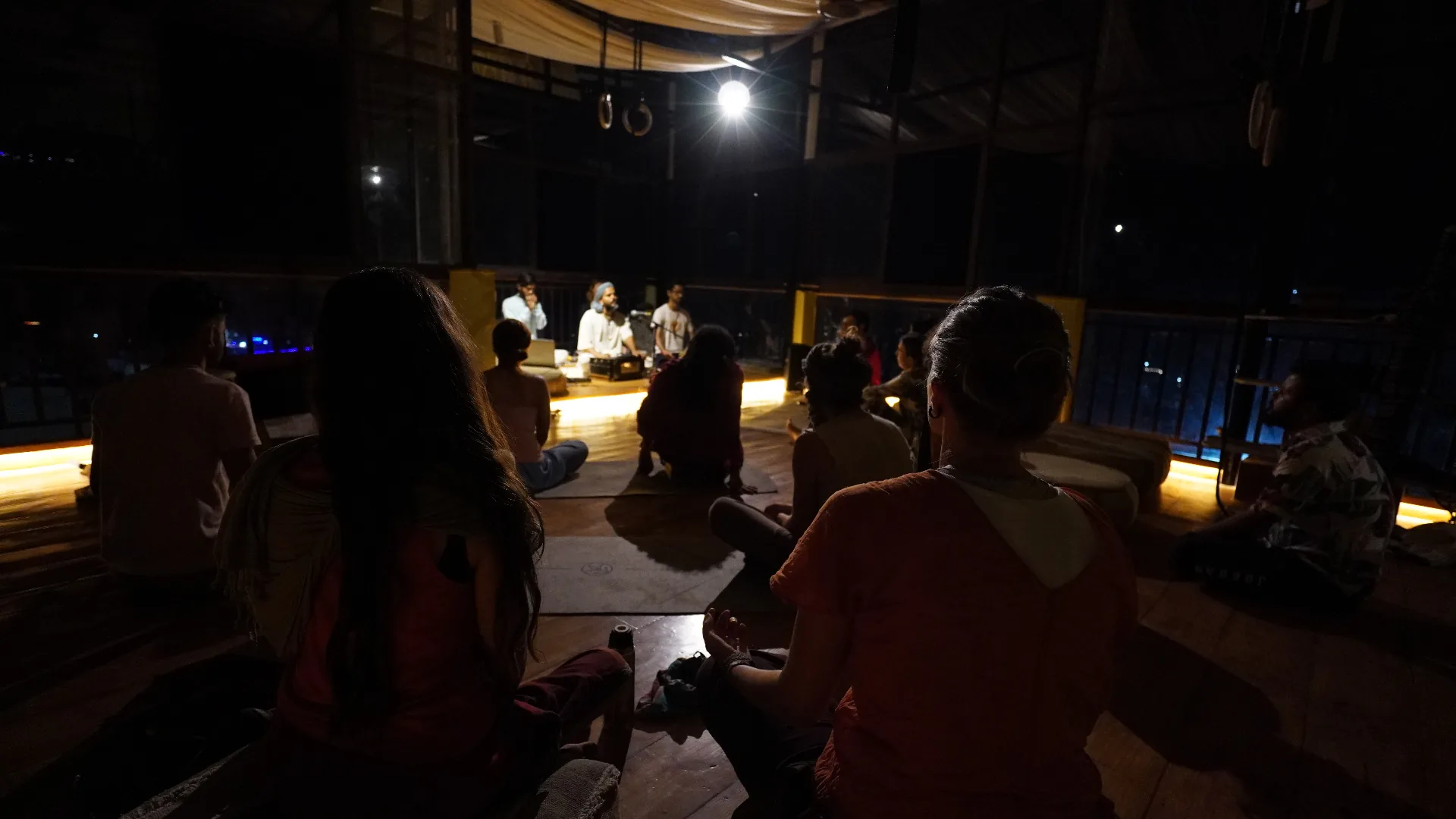 Evening gathering at Aavya retreat deck